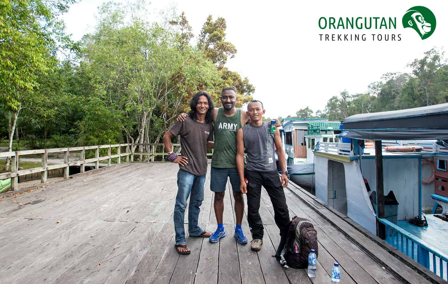 Jayaprakash, centre, with Orangutan Trekking Tours leader, Bain, left